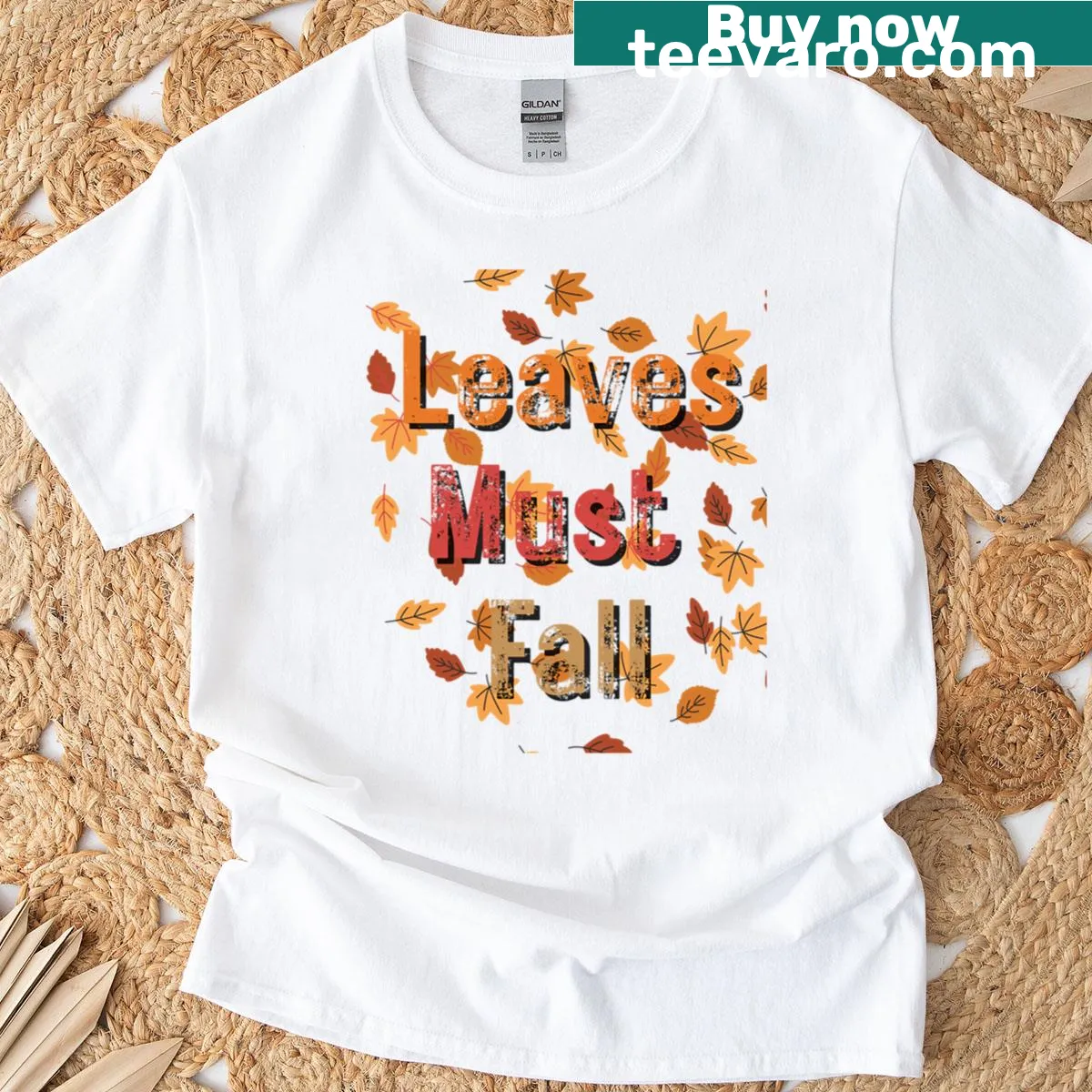 T-shirt featuring an illustration of falling leaves — on a men's t-shirt
