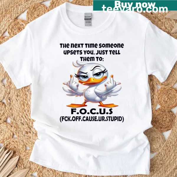 Funny t-shirt with the phrase 'Just Tell Them To Focus' in bold typography