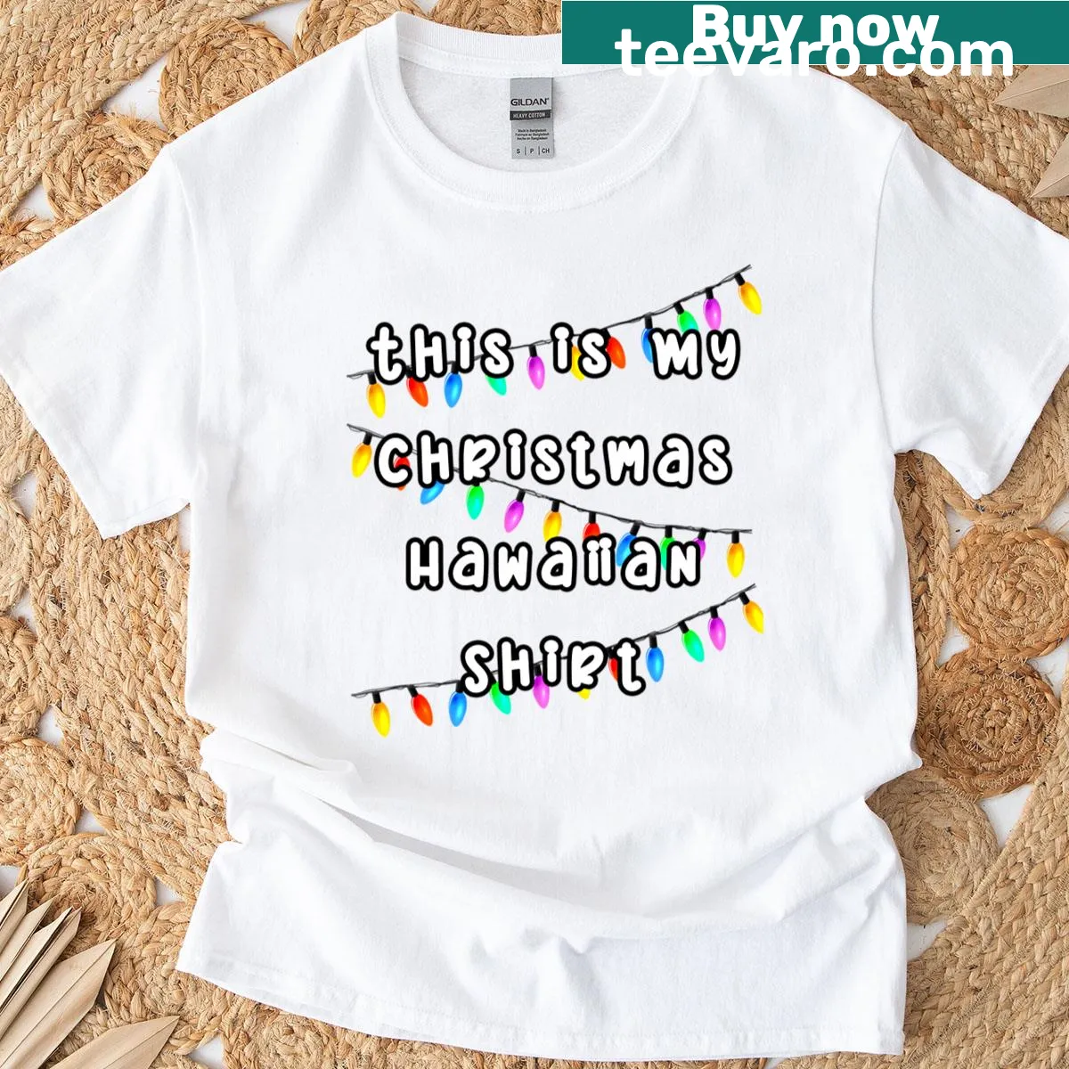 Hawaiian-themed Christmas T-shirt with playful typography — on a men's t-shirt
