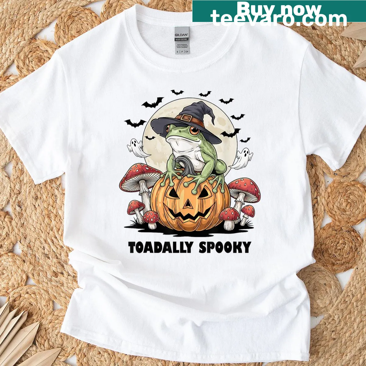 Cartoon frog on pumpkin with bats for a funny Halloween t-shirt — on a men's t-shirt