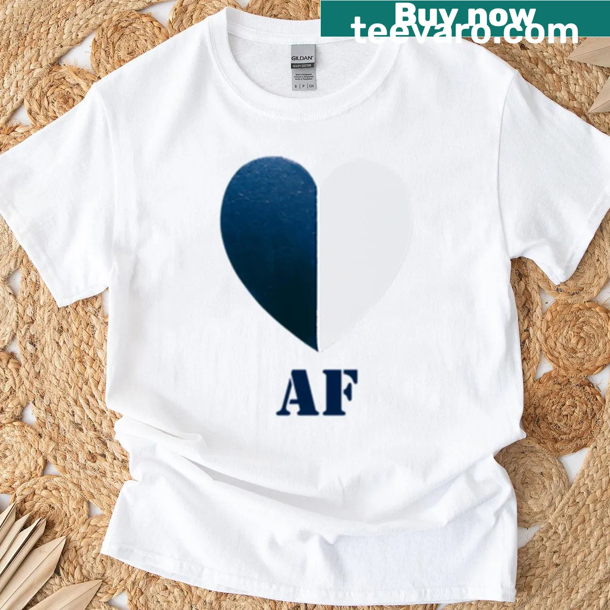 Blue and white painted heart graphic on a t-shirt — on a men's t-shirt