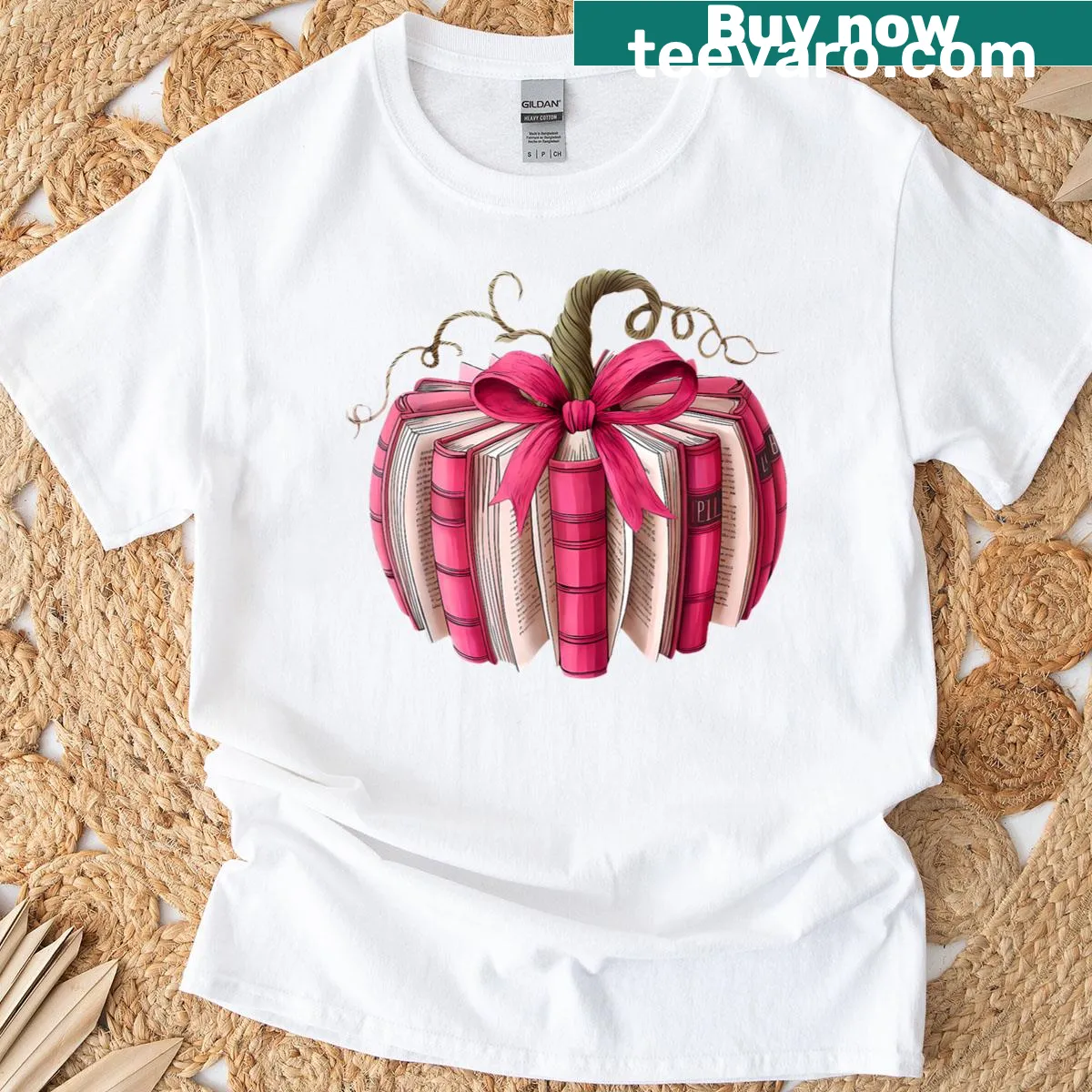 Illustrative t-shirt featuring books, pumpkins, and breast cancer awareness themes — on a men's t-shirt