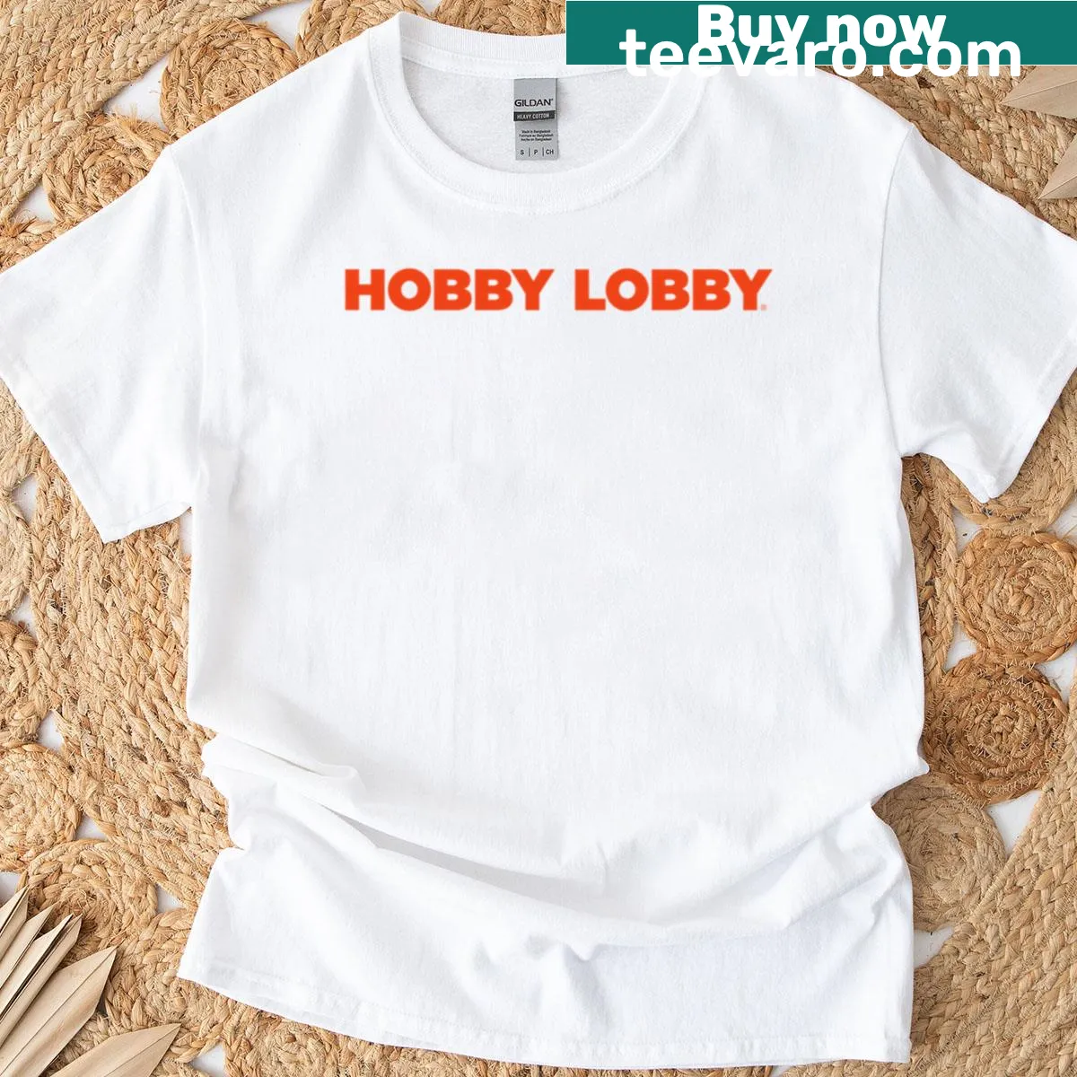 Playful cityscape T-shirt with blooming flowers illustration — on a men's t-shirt