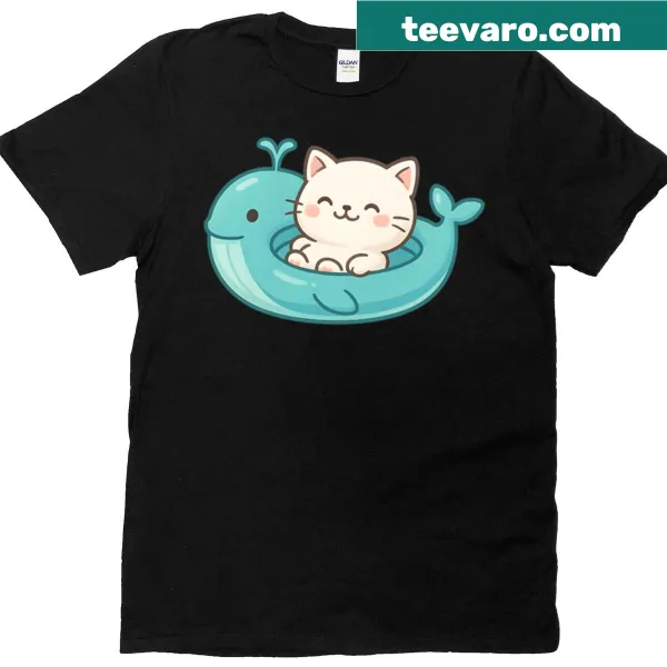 T-shirt featuring a cute beige cat on a blue whale float in an illustration