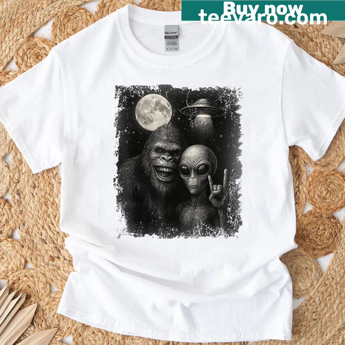Cartoon graphic of an alien and Bigfoot taking a selfie on a t-shirt — on a men's t-shirt