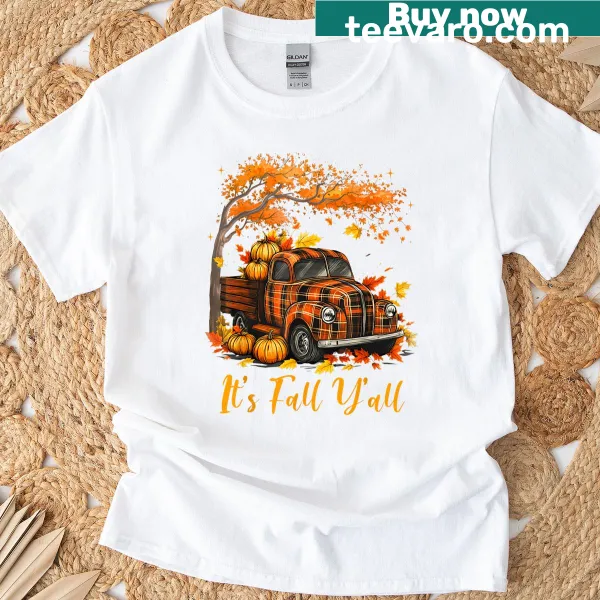 Illustration of a pumpkin truck surrounded by autumn trees on a women's t-shirt