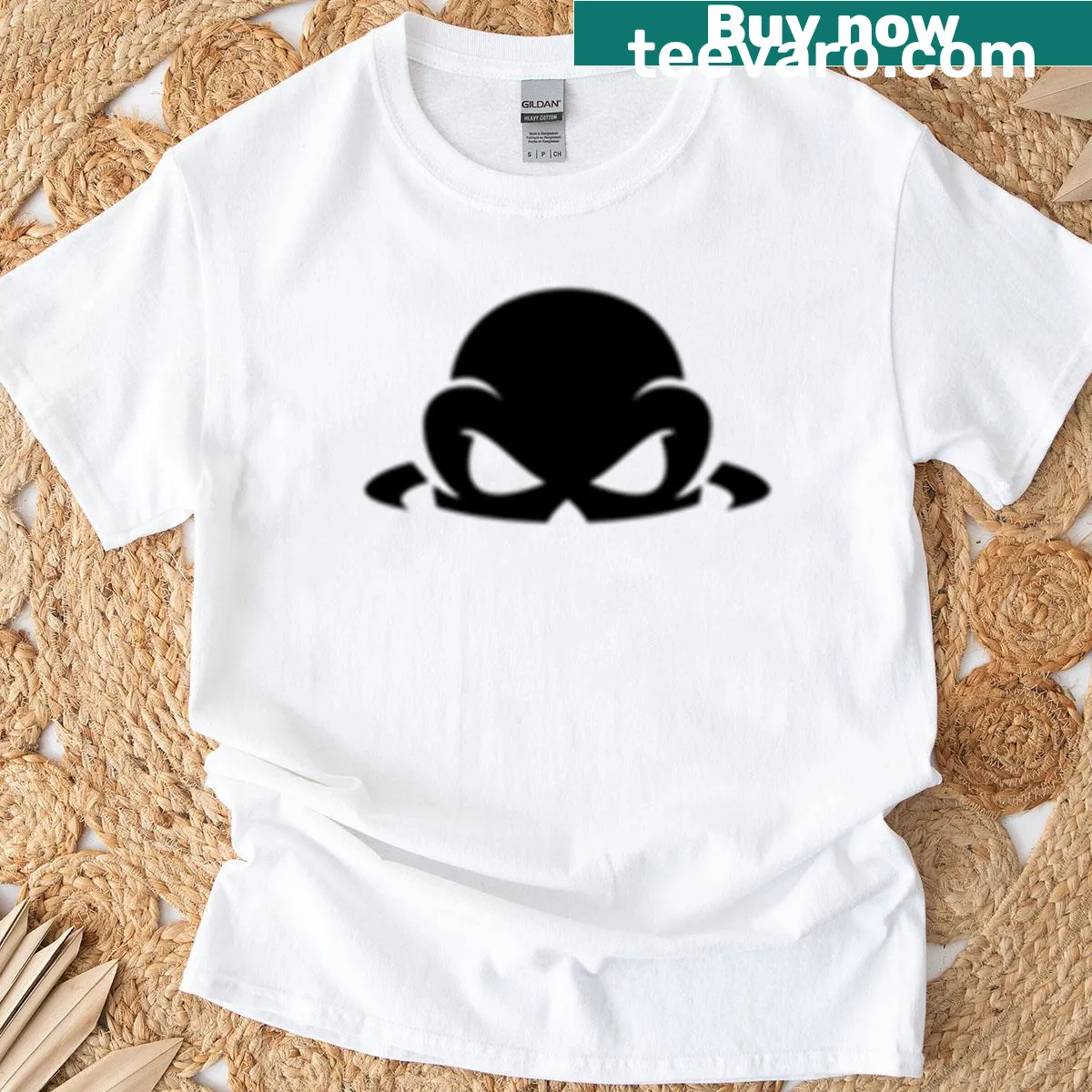 Minimalist skull logo t-shirt for dark aesthetic fans — on a men's t-shirt