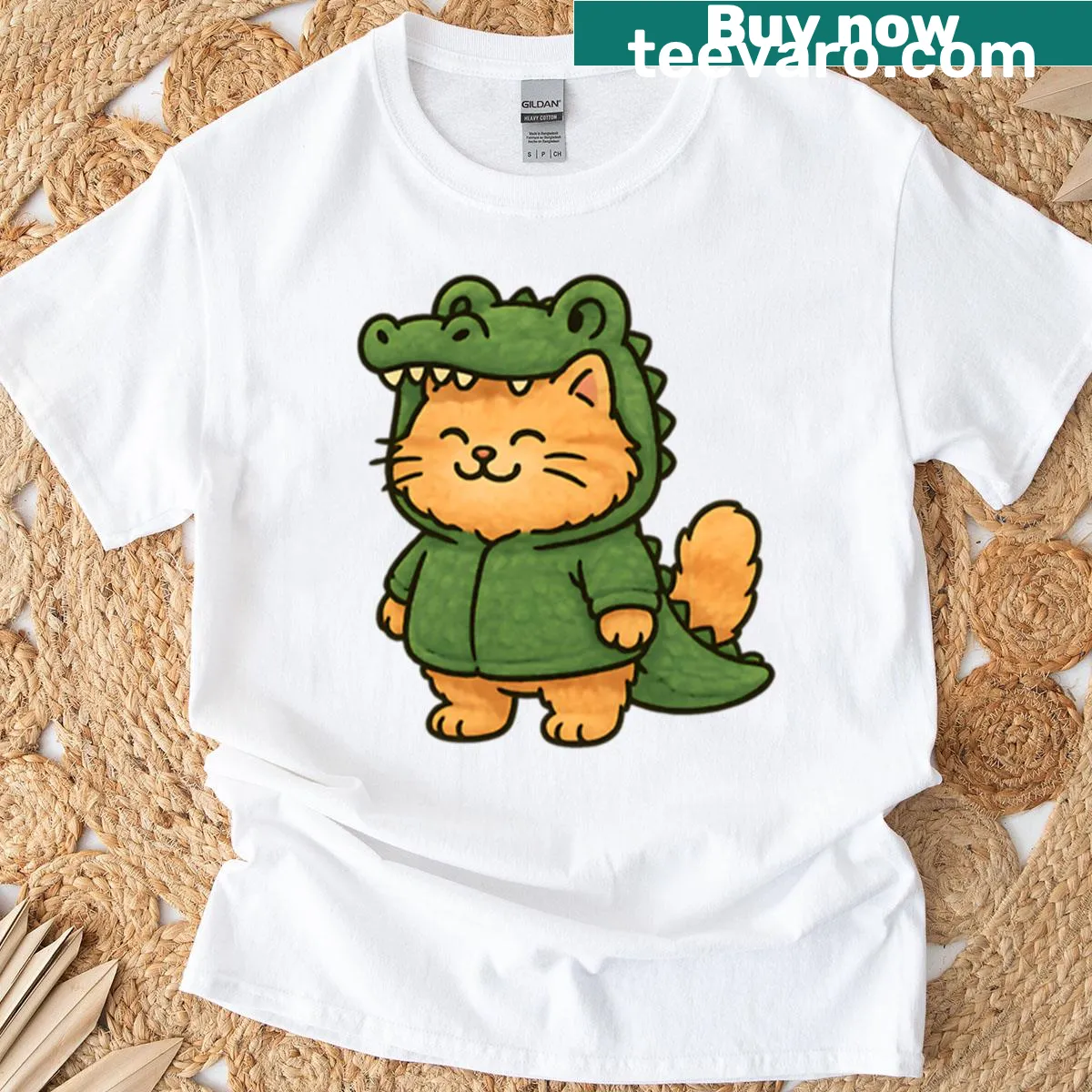 Cute illustration of an orange kitten in a green crocodile costume — on a men's t-shirt
