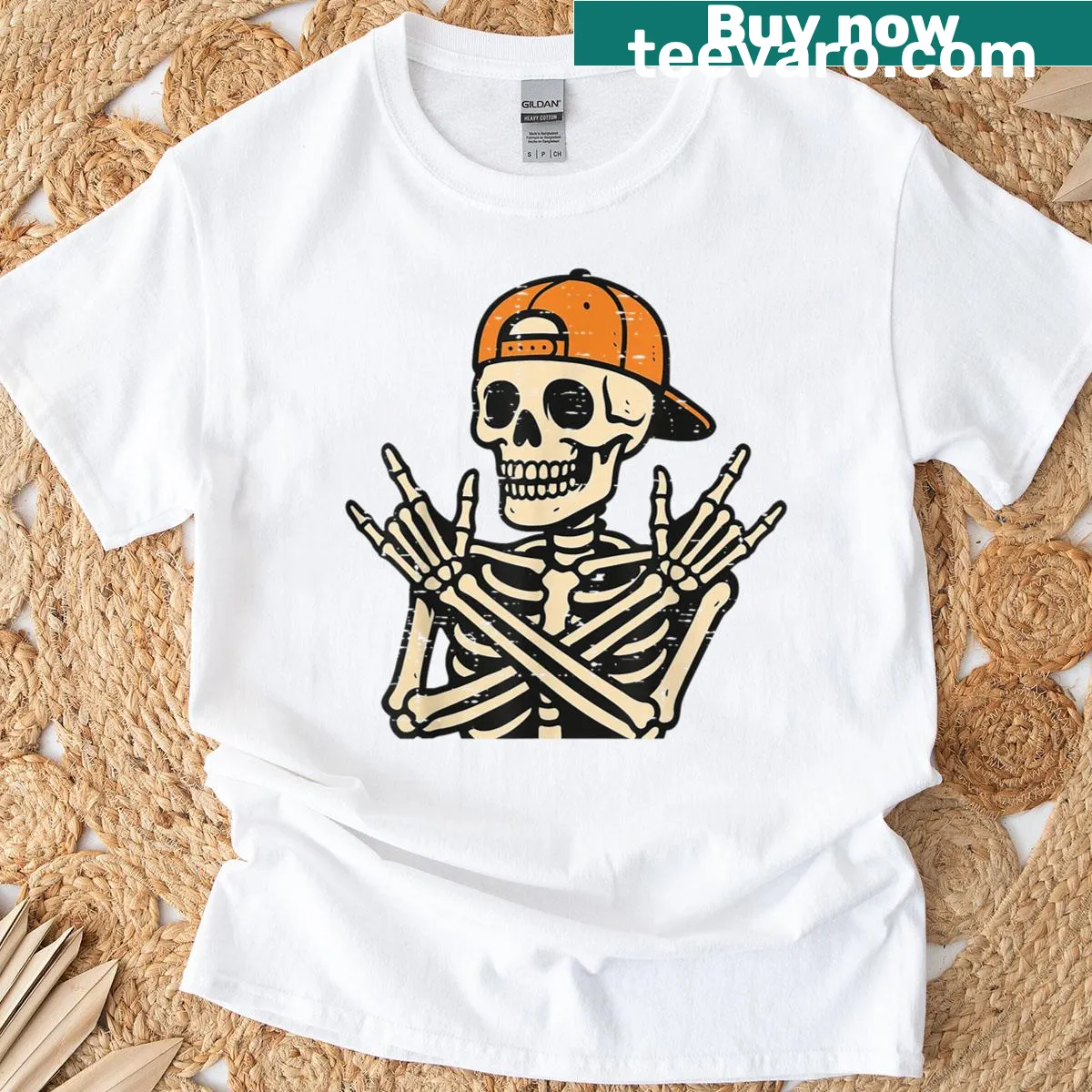 Cartoon rocker skeleton on skateboard graphic Halloween t-shirt — on a men's t-shirt