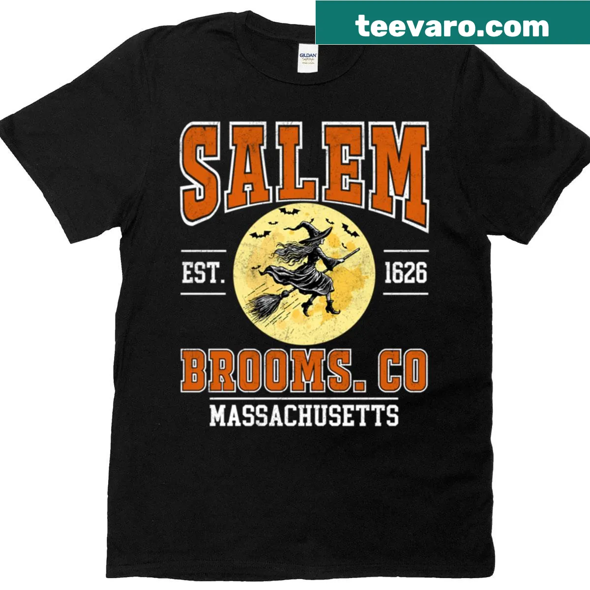Illustration of brooms alongside the year 1626 on a Salem-themed t-shirt. — on a men's t-shirt