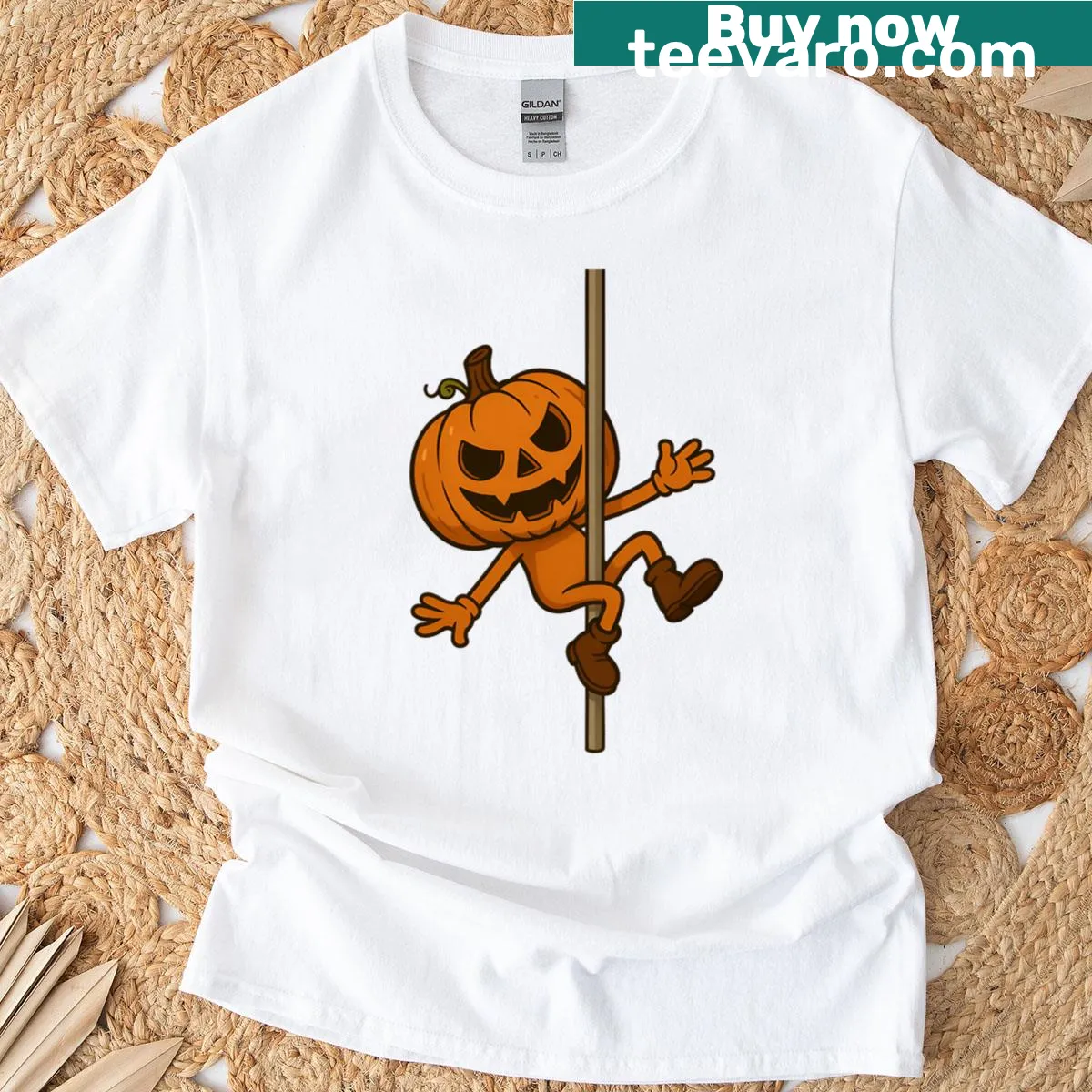 Cartoon pumpkin pole dancing design on a Halloween-themed t-shirt — on a men's t-shirt