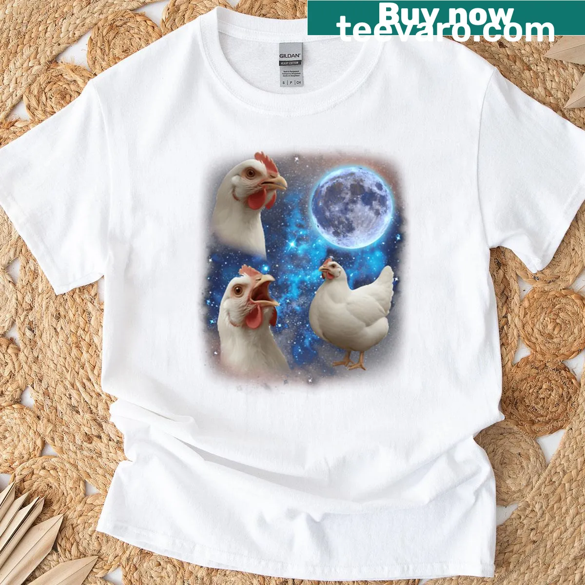 T-shirt with a graphic of three chickens howling at the moon — on a men's t-shirt