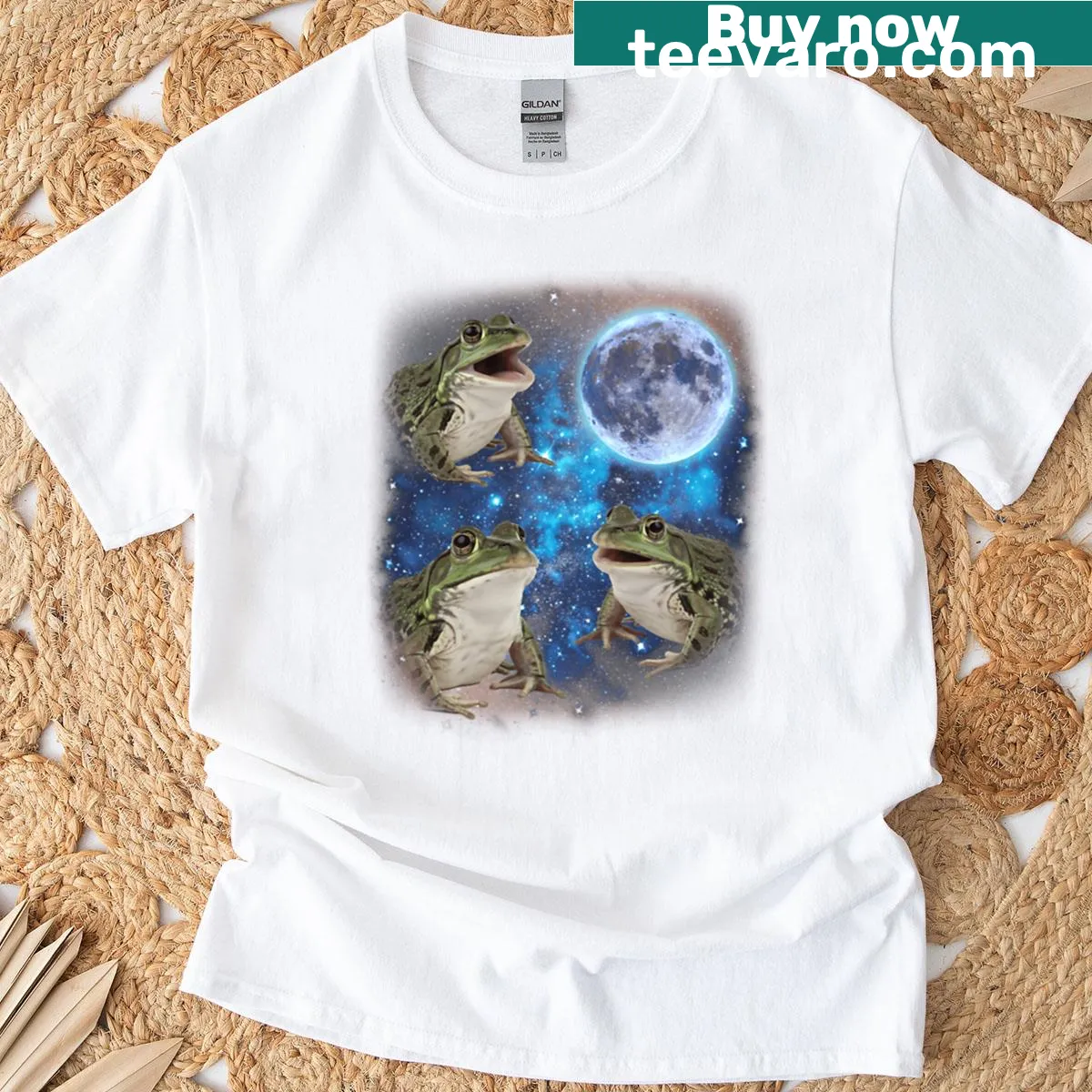 Three cartoon frogs howling at the moon graphic — on a men's t-shirt