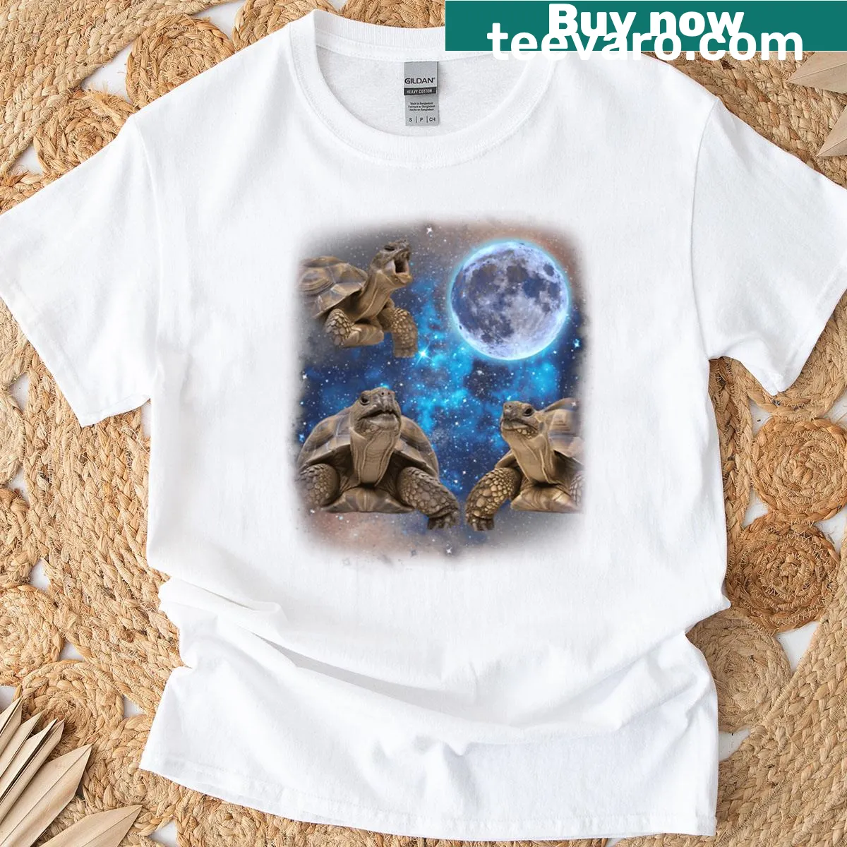 Funny T-shirt featuring cartoon tortoises howling at the moon — on a men's t-shirt
