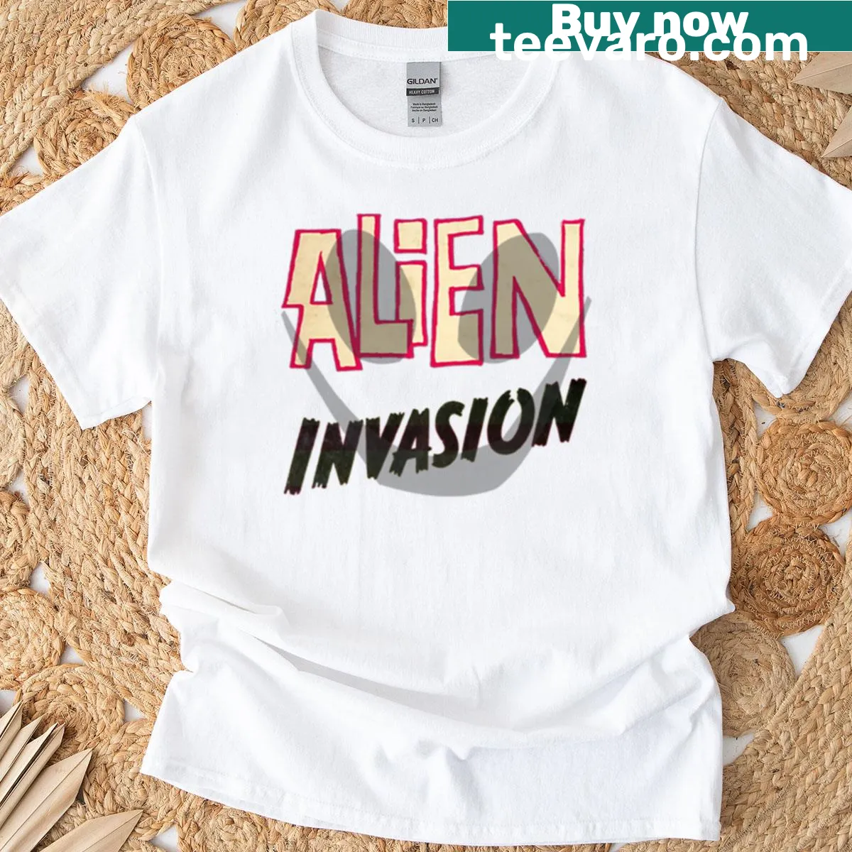 Vintage-style alien invasion t-shirt with playful cartoon aliens — on a men's t-shirt