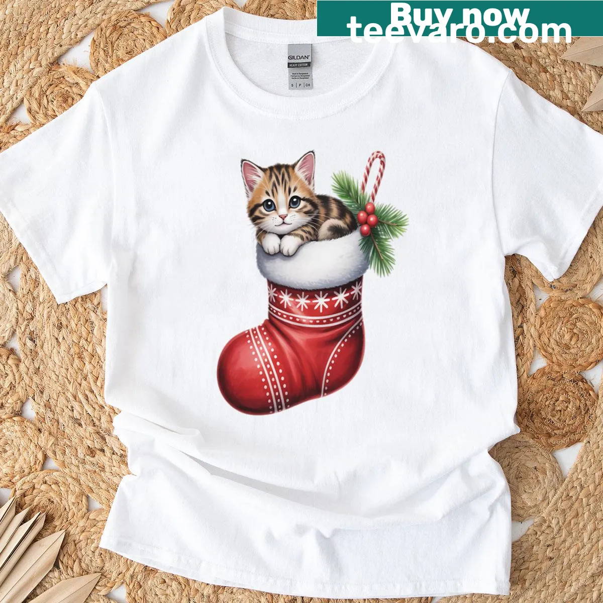 Christmas-themed t-shirt featuring a cat in a sock illustration — on a men's t-shirt