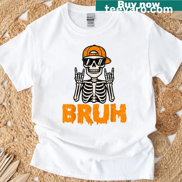 Cartoon skeleton rocking out T-shirt, funny Halloween design for kids.