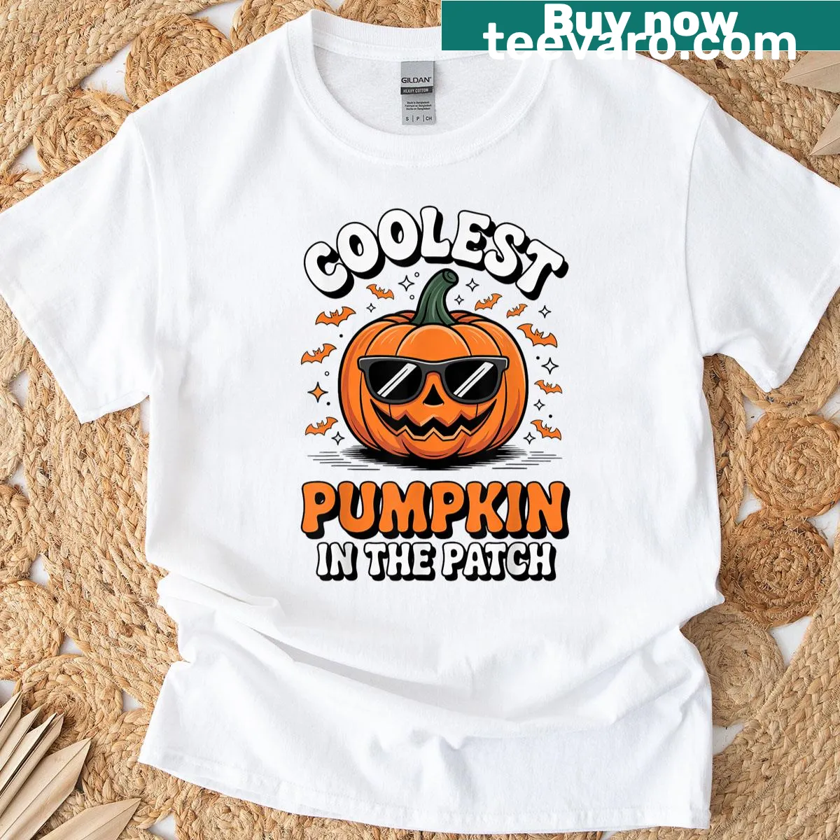 Cartoon pumpkin graphic with text 'Coolest Pumpkin In The Patch' for Halloween — on a men's t-shirt