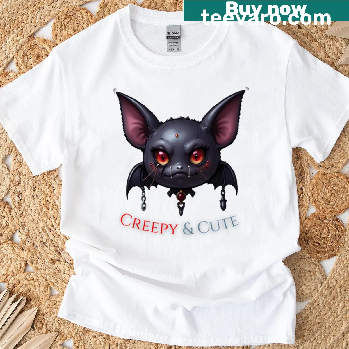 Gothic-style bat graphic t-shirt with creepy-cute aesthetic — on a men's t-shirt