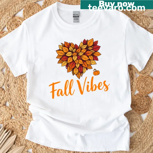 T-shirt featuring a heart design made of autumn leaves and pumpkins