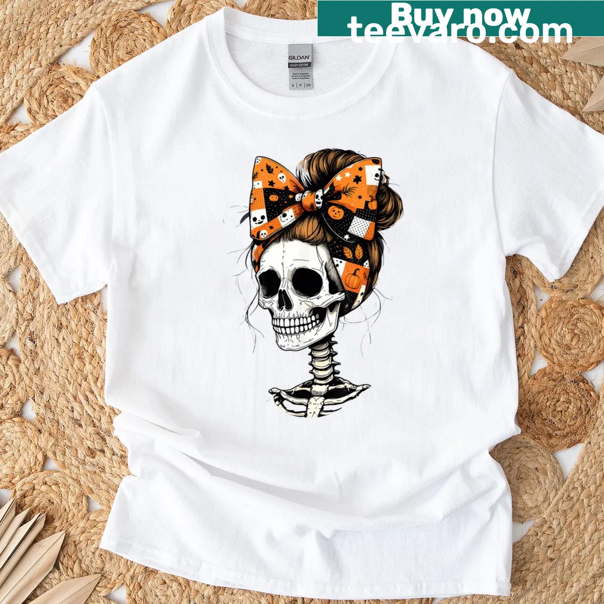 Whimsical skeleton girl design with a pumpkin bow for Halloween fun. — on a men's t-shirt
