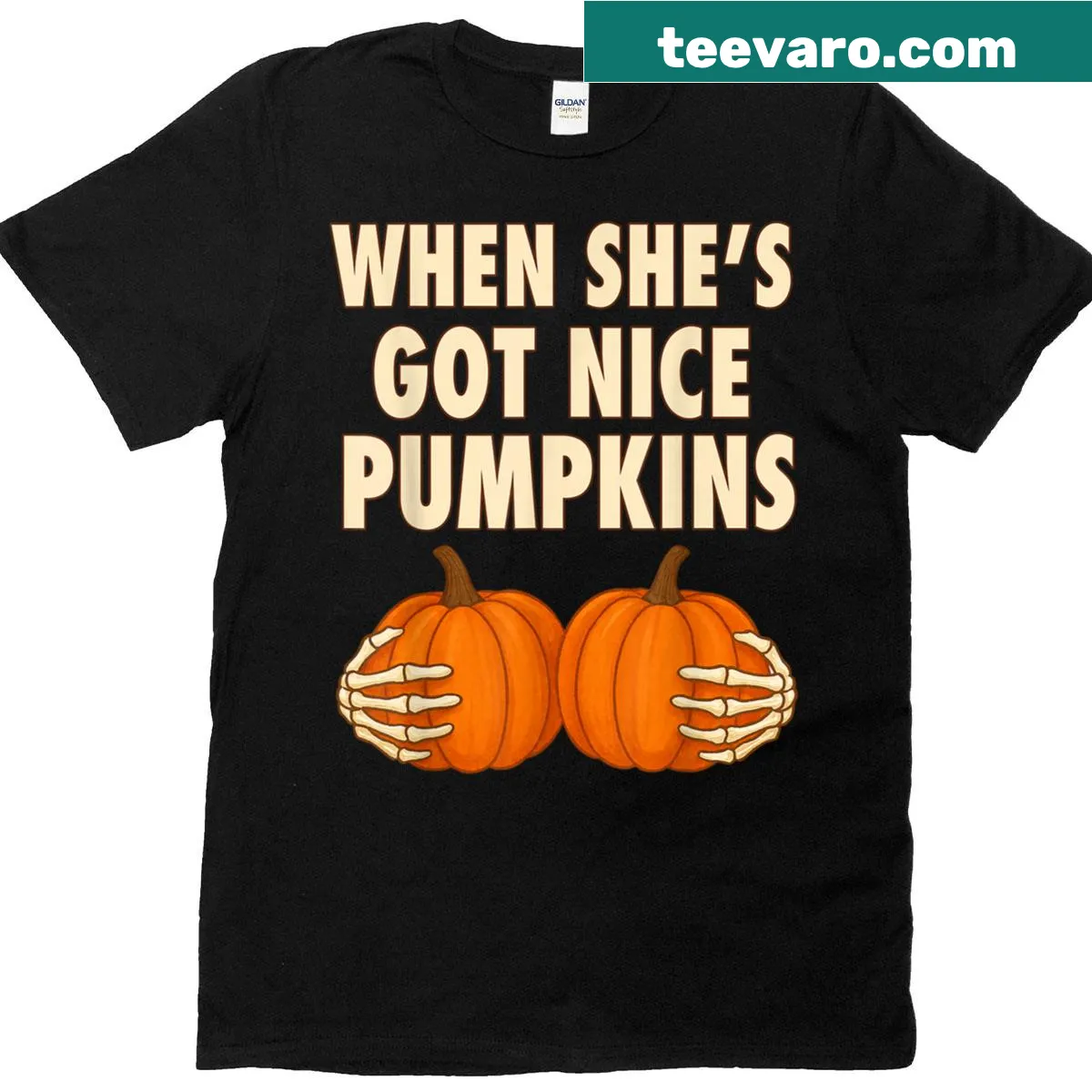 Skeleton hands humorously holding pumpkins for Halloween — on a men's t-shirt