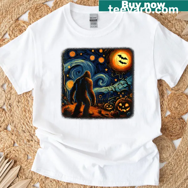 Bigfoot in a starry night scene with pumpkins on a Halloween t-shirt
