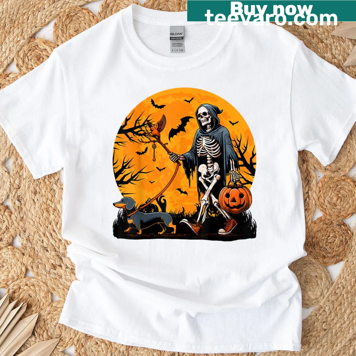 Illustration of a skeleton dog on a lead for Halloween, featuring a dachshund theme. — on a men's t-shirt