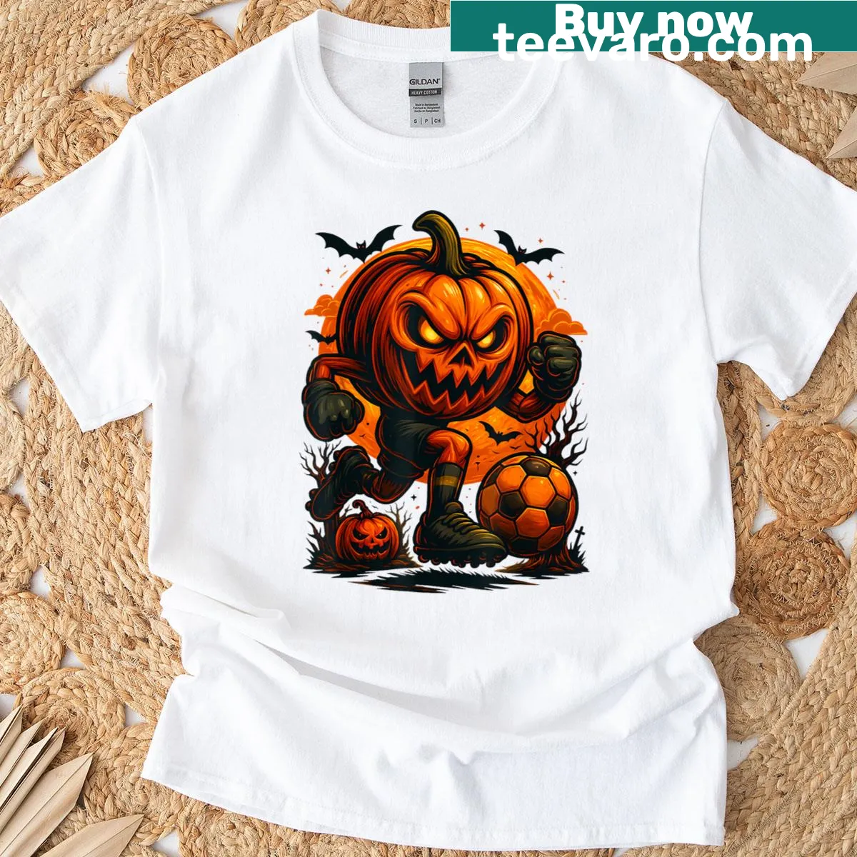 Halloween pumpkin showing soccer skills in graveyard — on a men's t-shirt