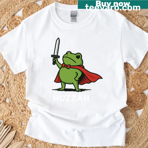 Playful t-shirt featuring a cartoon frog with the word 'Huzzah'