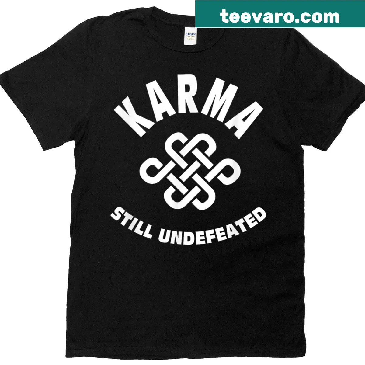 Karma Still Undefeated quote on a T-shirt in bold typography — on a men's t-shirt