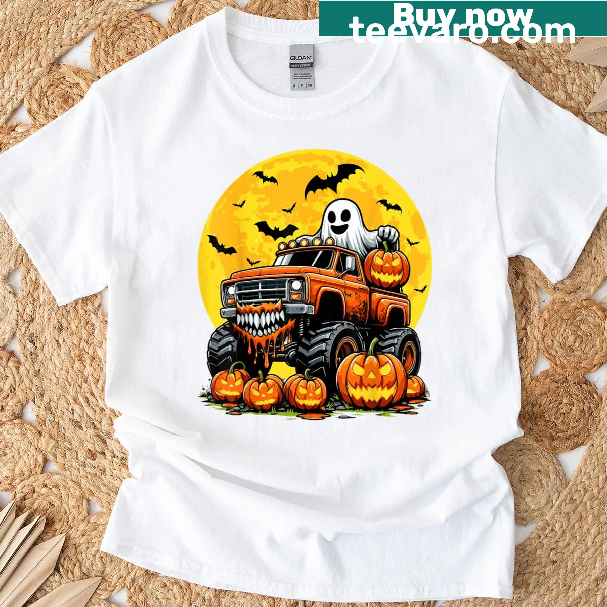 Child's Halloween t-shirt with a monster truck and ghost illustration — on a men's t-shirt