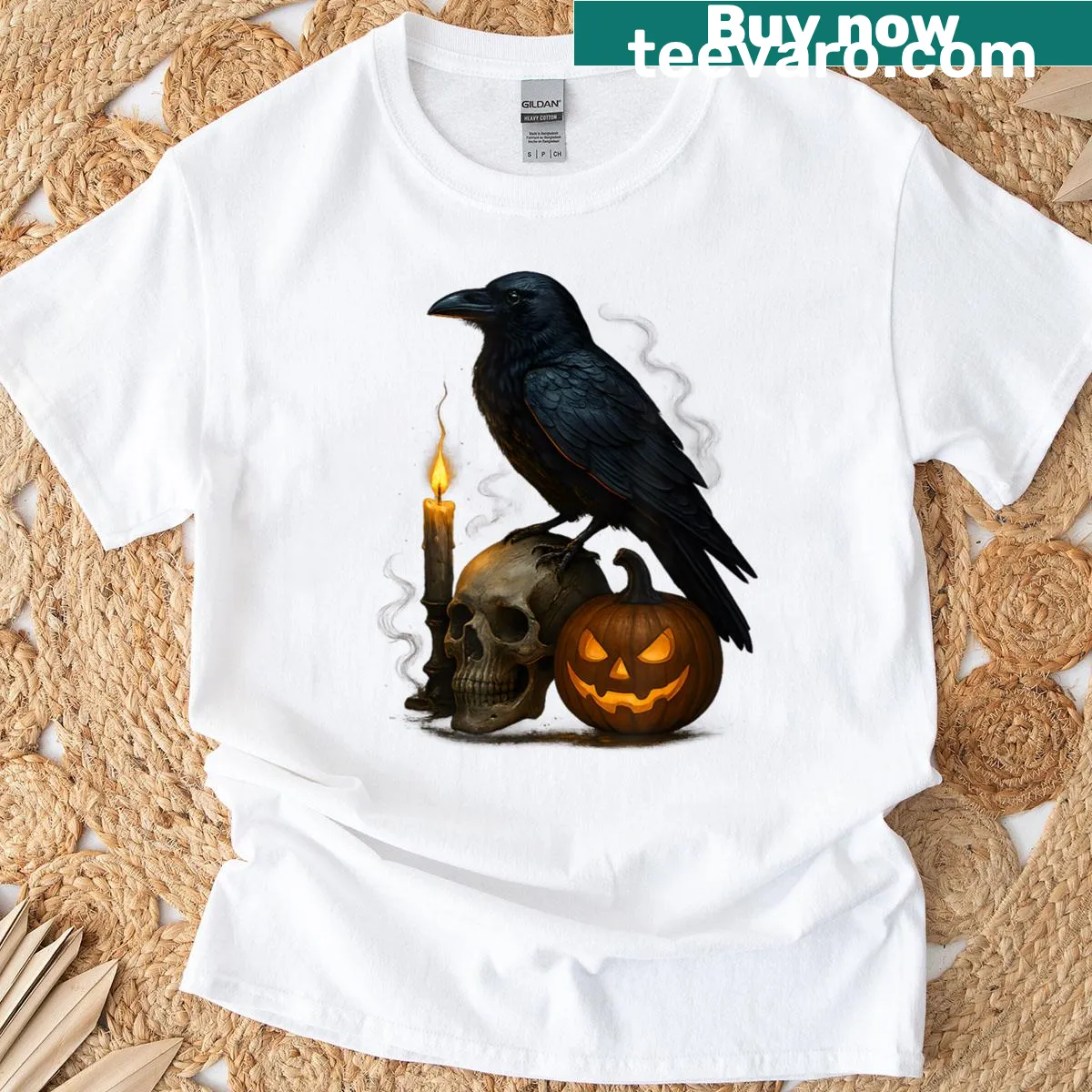 Raven on skull with pumpkin Halloween motif graphic — on a men's t-shirt