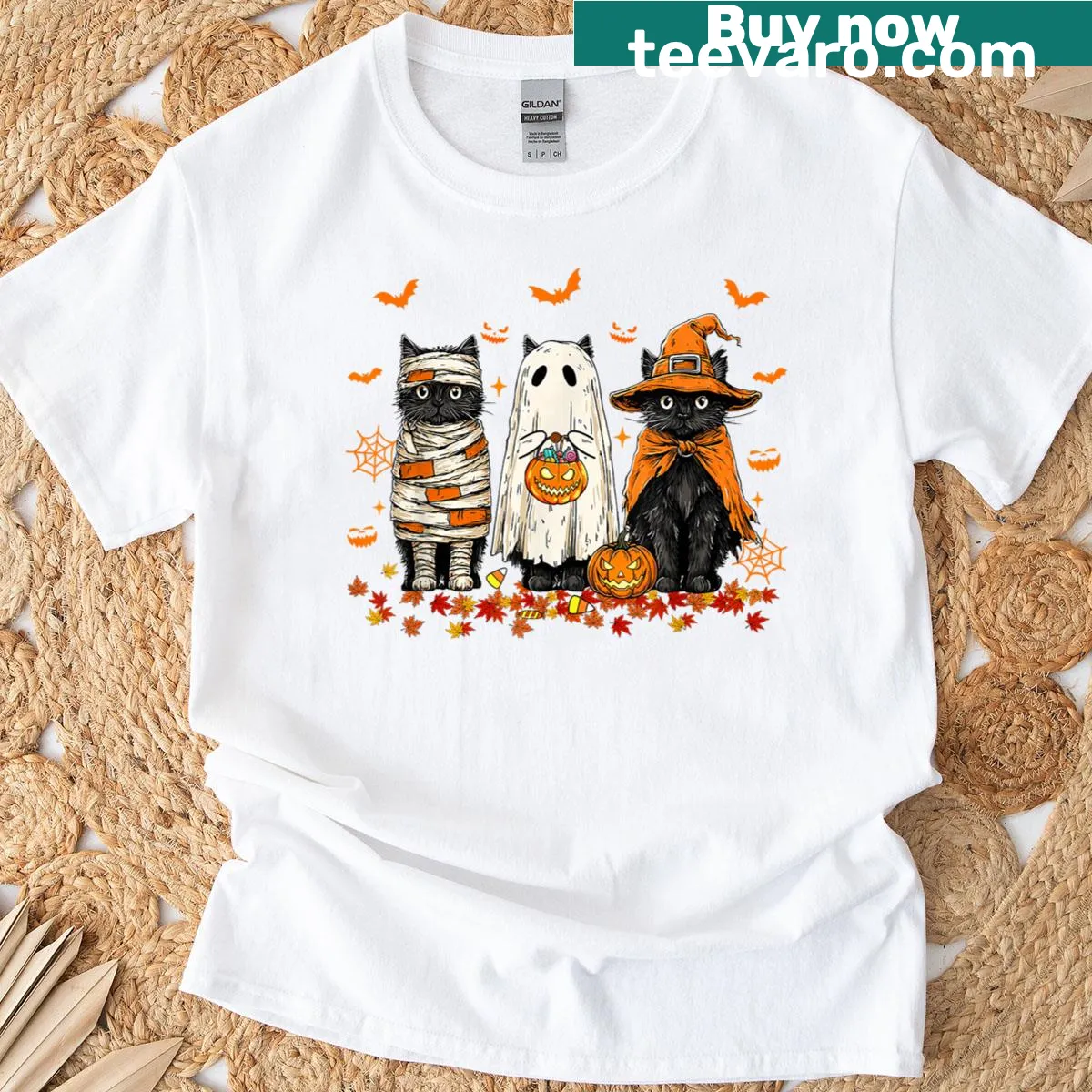 Retro Halloween T-shirt with a ghost, witch, and black cat graphic — on a men's t-shirt