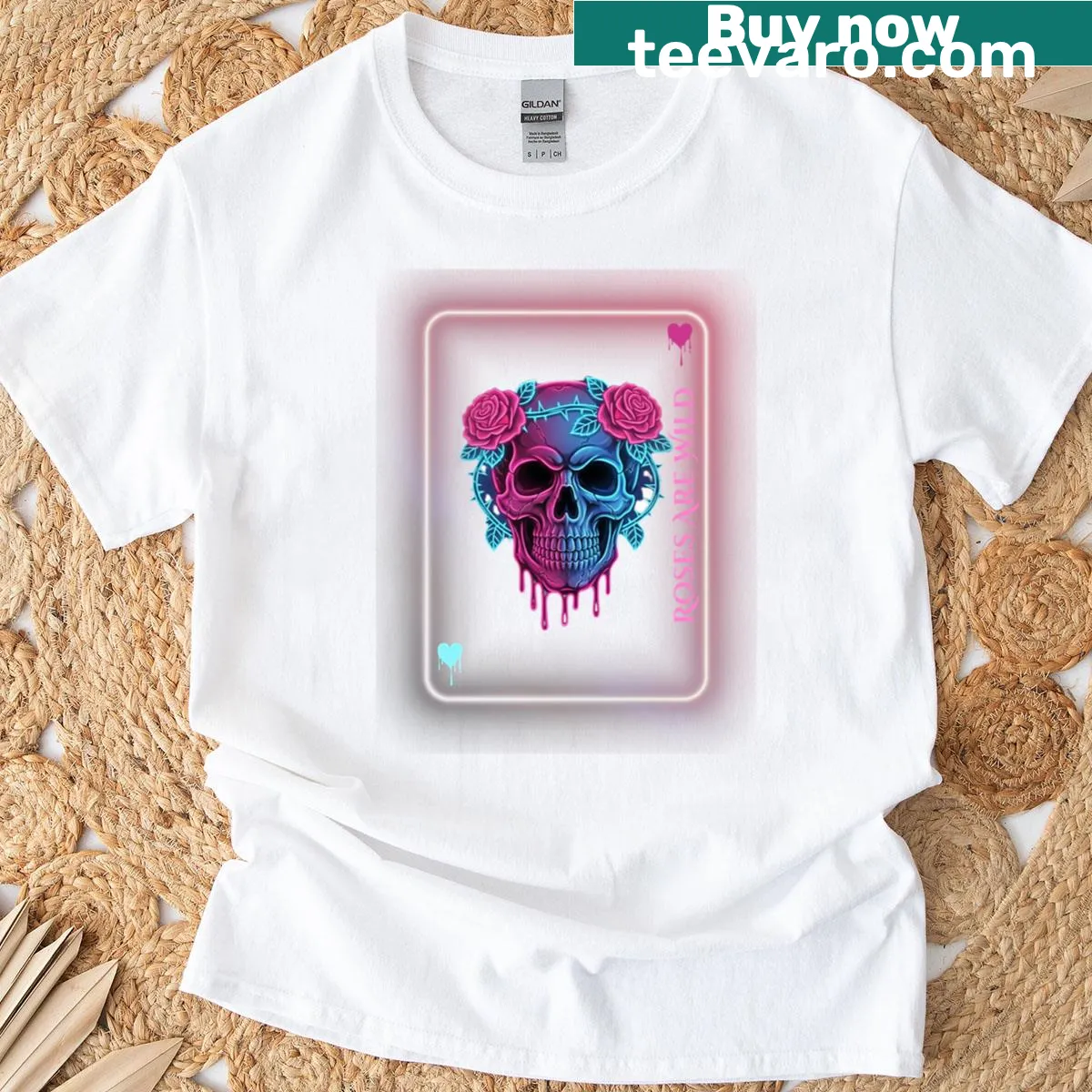 Neon skull t-shirt with wild roses and playing card design — on a men's t-shirt