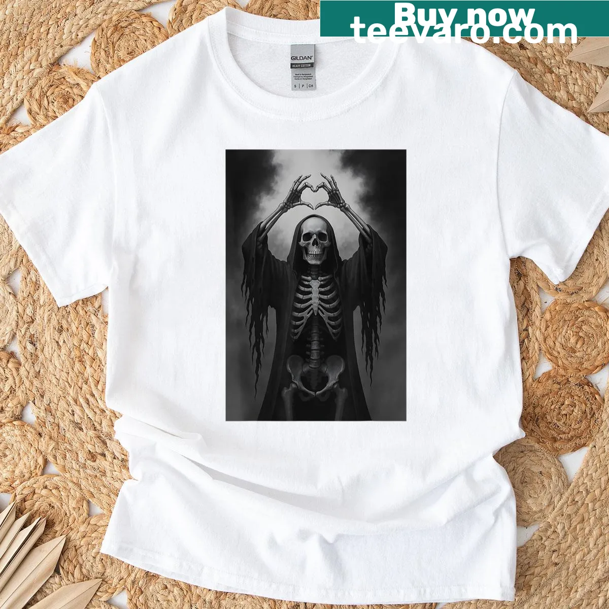 Skeleton hands forming a heart above a scary face graphic — on a men's t-shirt