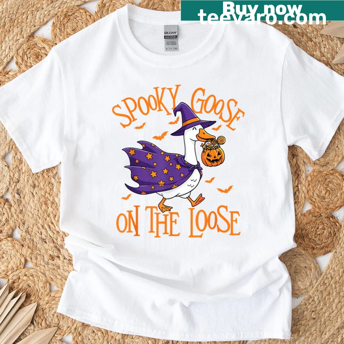 Whimsical goose and jack-o'-lantern design on a t-shirt — on a men's t-shirt