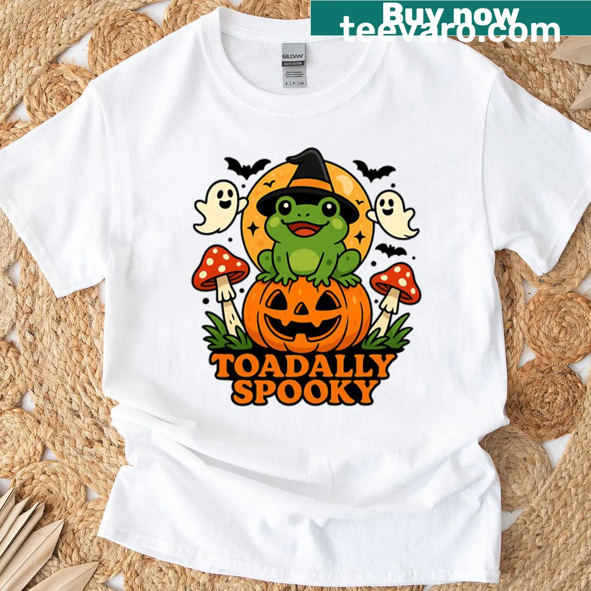 Cute witch frog on a pumpkin Halloween T-shirt — on a men's t-shirt