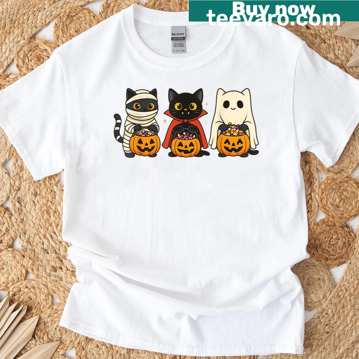 Cute Halloween T-shirt with costumed cats and a pumpkin — on a men's t-shirt