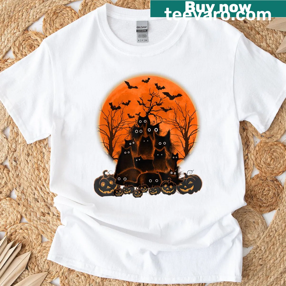Vintage Halloween shirt featuring a black cat, moon, and pumpkin in a playful design — on a men's t-shirt