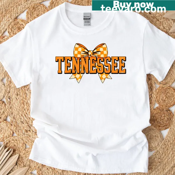 Vintage Tennessee T-shirt with checkered orange design and bow.