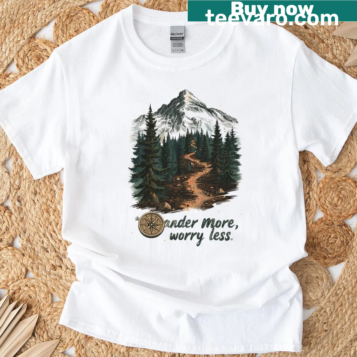 Illustrated T-shirt with outdoor adventure theme and motivational quote — on a men's t-shirt