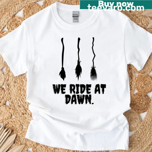 Funny Halloween T-shirt featuring witches on broomsticks design