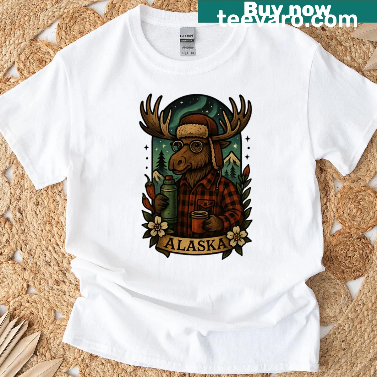 Vintage-style T-shirt featuring a moose and Northern Lights design — on a men's t-shirt
