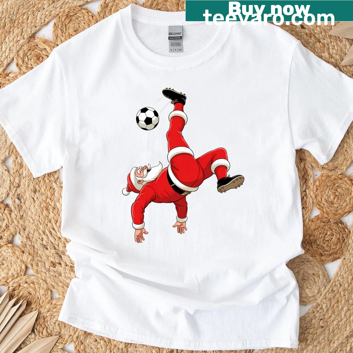 Santa executing a bicycle kick in a festive, playful soccer graphic — on a men's t-shirt
