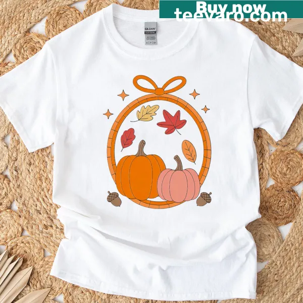 Cartoon design of pumpkins and bow on a T-shirt