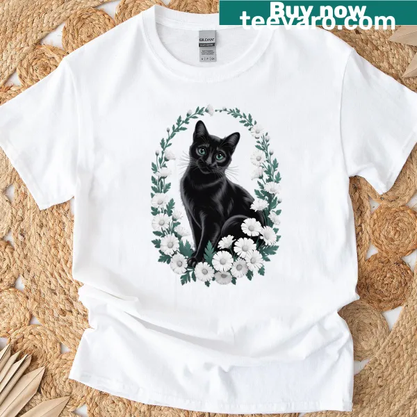 Whimsical black cat surrounded by flowers on T-shirt