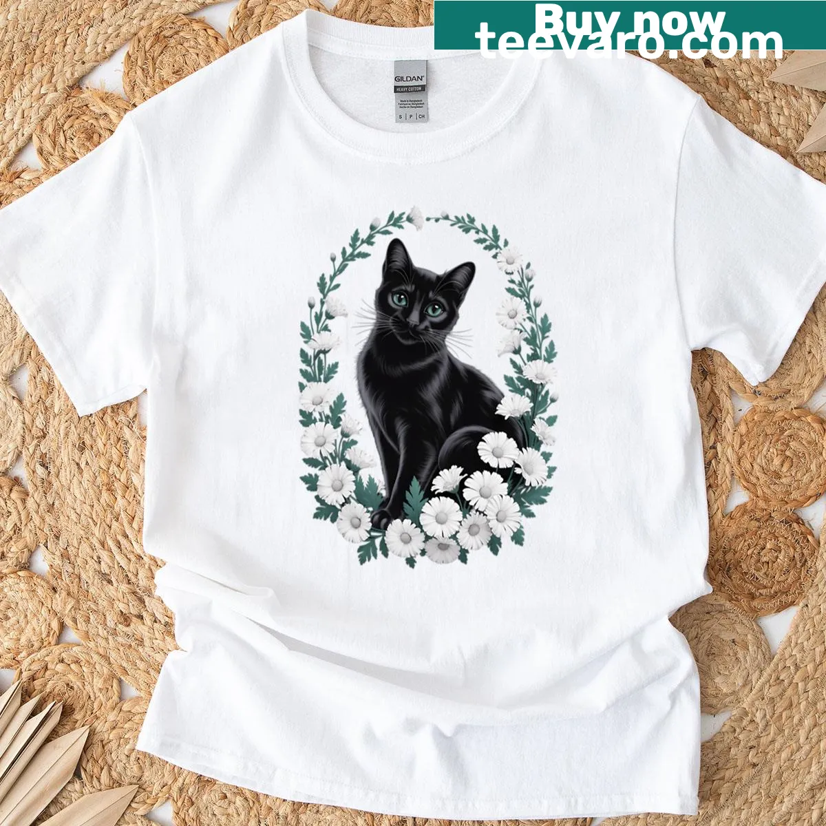 Whimsical black cat surrounded by flowers on T-shirt — on a men's t-shirt