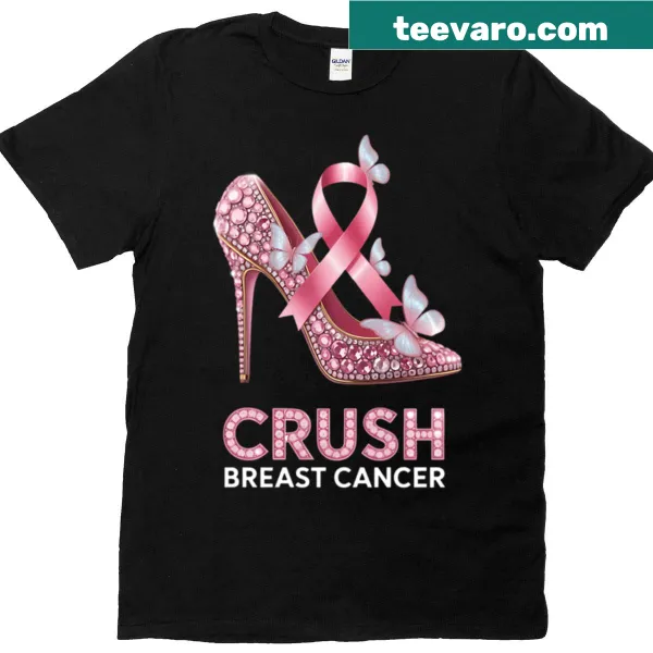 Pink ribbon with bling accents graphic on a t-shirt.