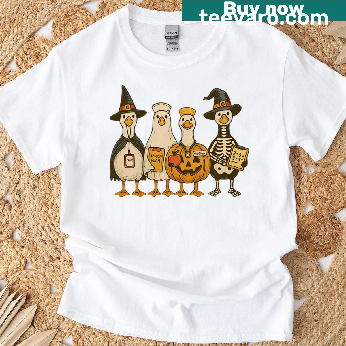 Cute goose in a witch hat with Halloween elements on T-shirt — on a men's t-shirt